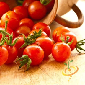 Red cherry tomato seeds, small indeterminate variety from SeedsNow, shown in a close-up image with vibrant red tomatoes.